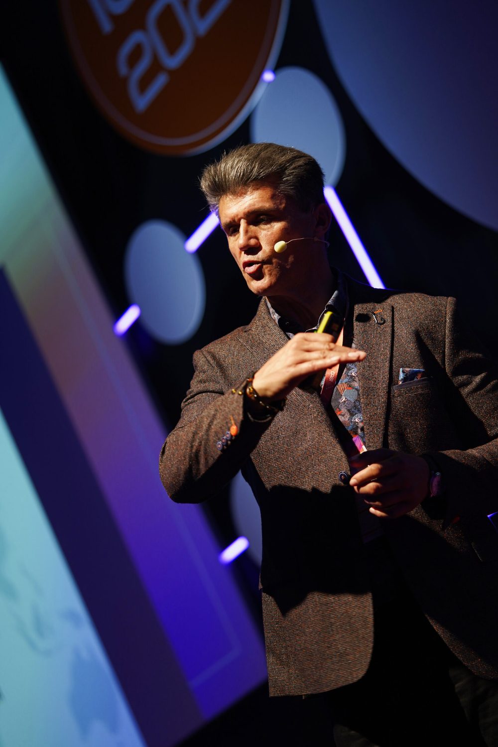 Peter Ivanov speaking on stage